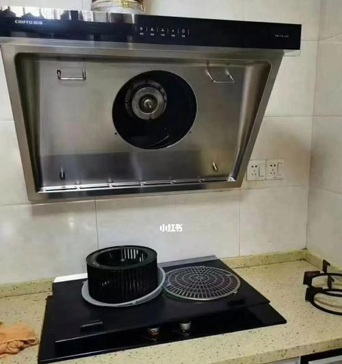 如何正确清洗海尔油烟机风轮（海尔油烟机风轮清洗方法及注意事项）  第1张