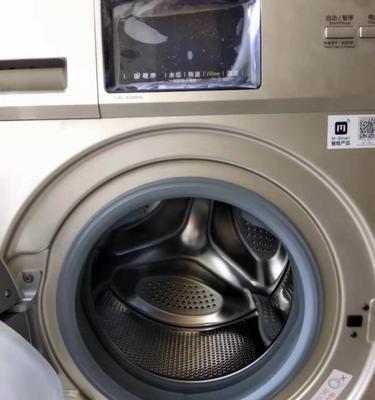 滚筒洗衣机漏油的修复方法（探索滚筒洗衣机漏油问题的解决方案）  第1张